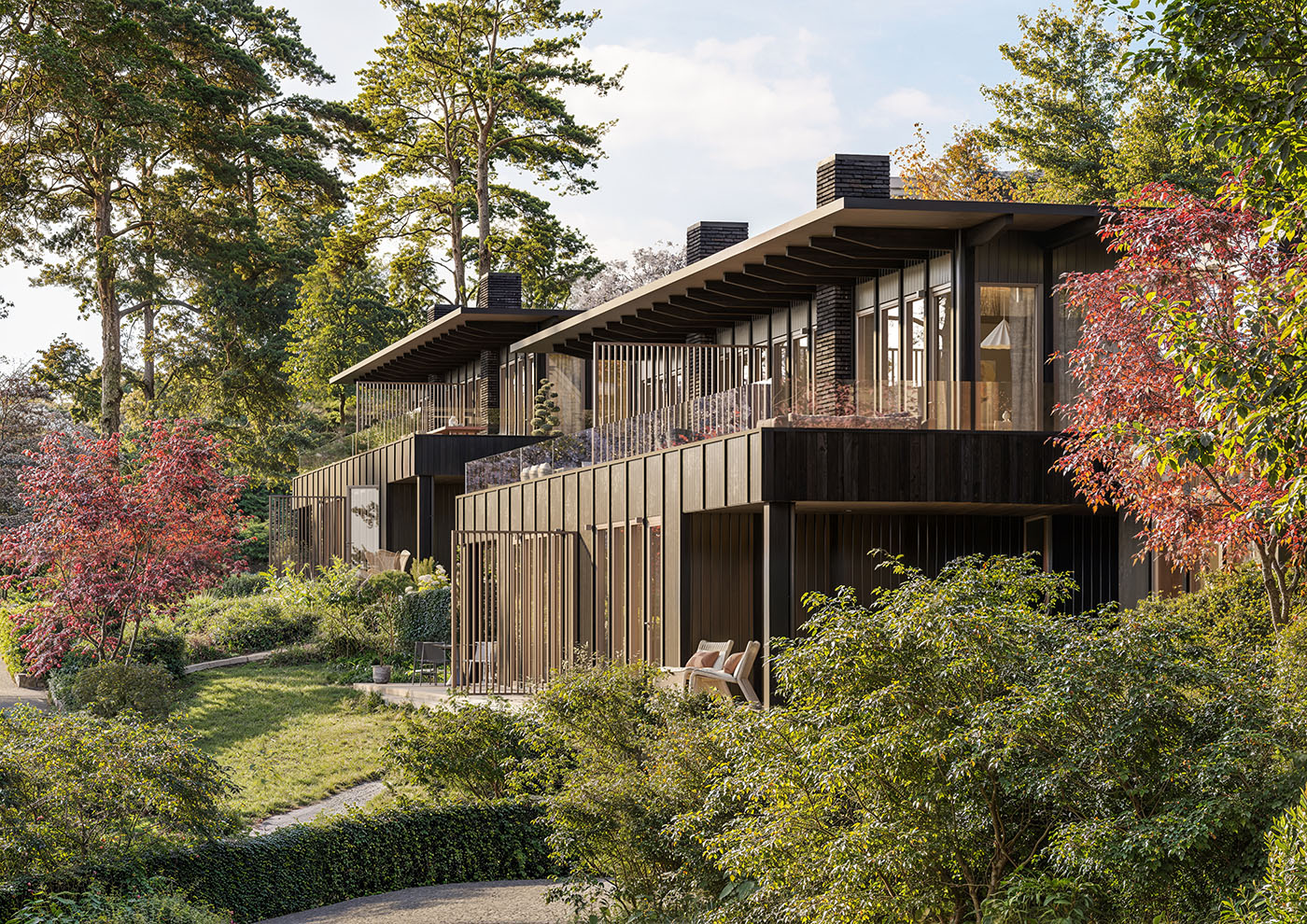 Shizukana row of homes with vertical timber screens