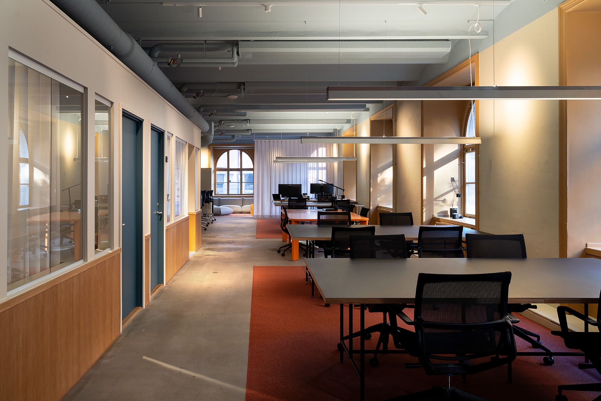 Corridor and open studio floor at Acne Advertising