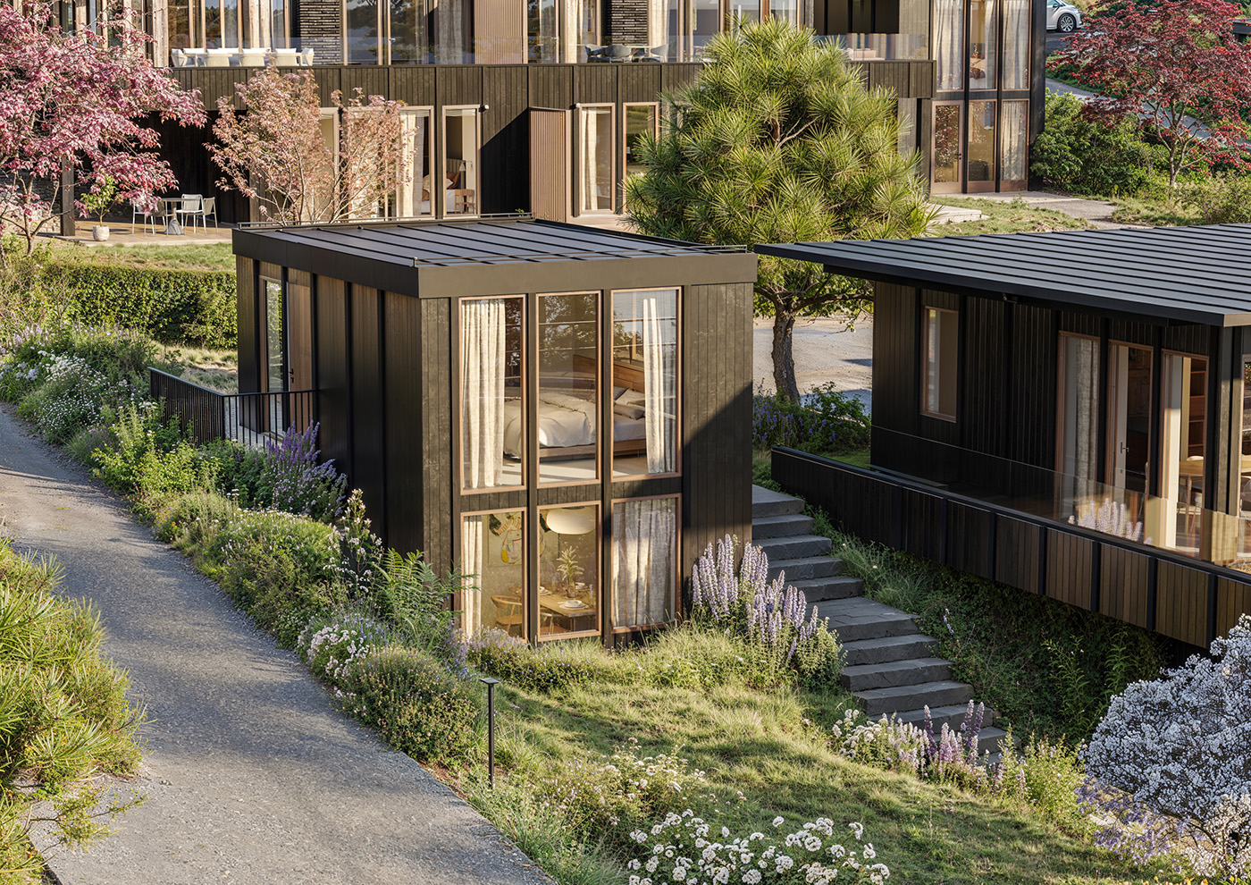 Shizukana studio house among planted gardens